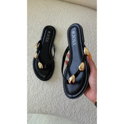 Claquettes noires détails dorés