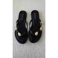 Claquettes noires détails dorés