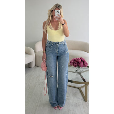 Jeans bleu foncé retroussé troué barrel