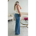 Jeans extra long noeud bleu