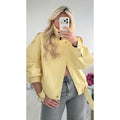 Veste simili col montant jaune pastel